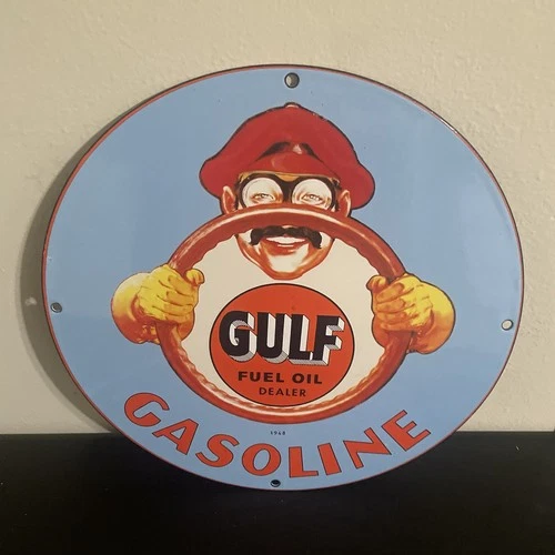 VINTAGE GULF DRIVING MAN GASOLINE MOTOR OIL PORCELAIN SIGN