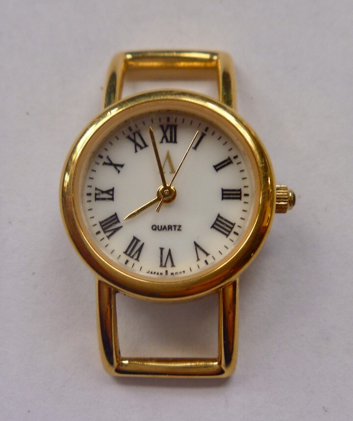 Vintage Avon quartz watch gold tone stainless steel back no  display picture 1