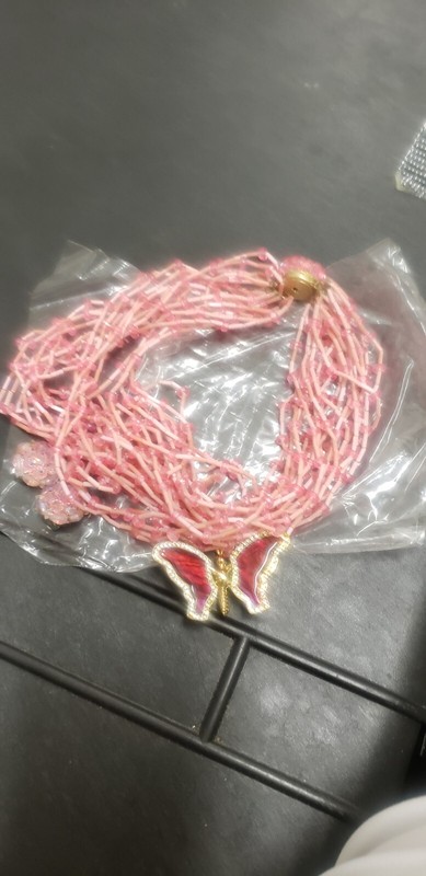antique pink beaded necklace ear rings and butterfly pin