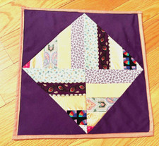 Quilted Patched Table topper, new handmade 13.5x13.5 purple and colored stripes