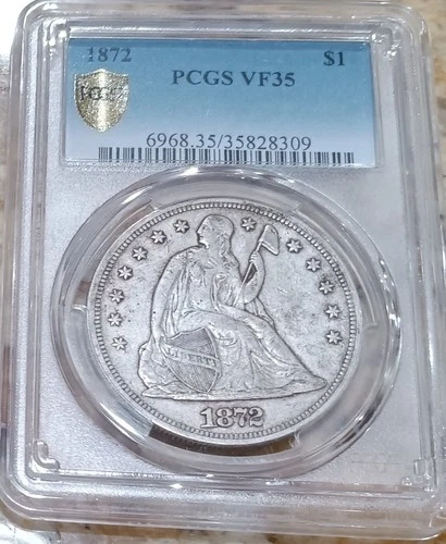 1872 Liberty Seated dollar, NGC VF-35