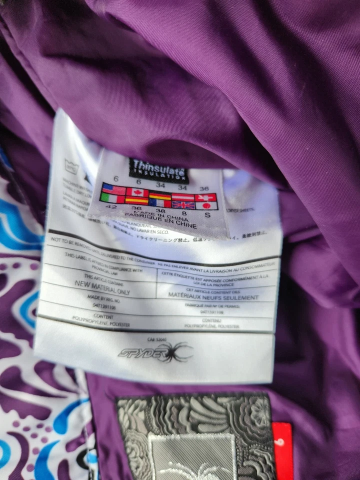 Pantalones de esquí/snowboard Spyder juveniles blancos/color salpicaduras forrados aislantes talla 6 usados en excelente estado Foto 4 de 4