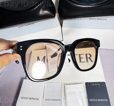 GentleMonster Una.C N 01(OR) Sunglasses Black Frame Orange Lenses
