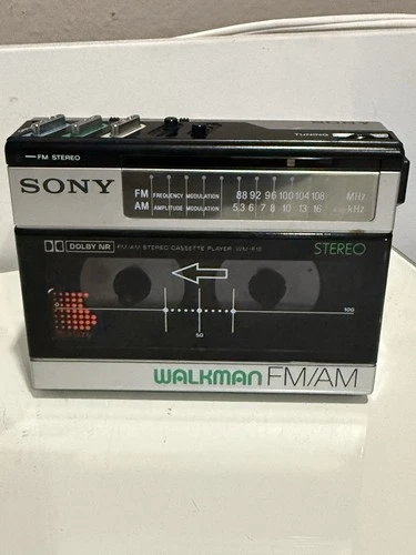 Sony Walkman WM-F15 with belt clip. FOR PARTS ONLY .