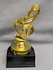 gold music note trophy award round black base with wrist band removeable