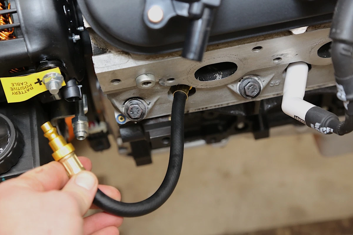 Thread adapter into cylinder head - engine leak down testing - 05