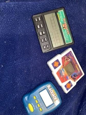 Vintage Portable 3 Hand Held Game Systems AA8