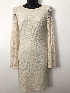 short white dress with bell sleeves