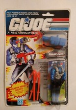Hasbro GI Joe Snake Eyes 1990 in original package & shooting hook. MOC