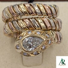 18k gold diamond ring is snake motif