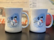 Two Lindor Lindt 2006 Holiday Snowman Mugs