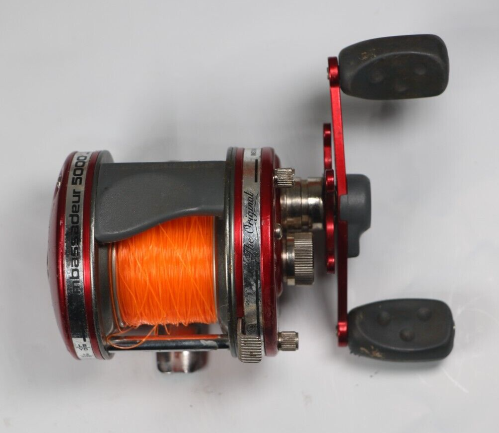 Vintage Abu Ambassadeur 5000 Red 4 Screw Fishing Reel for sale