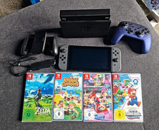 Nintendo Switch V2 (besserer Akku) + 4 Top-Spiele Zb (Mario Kart, Zelda …