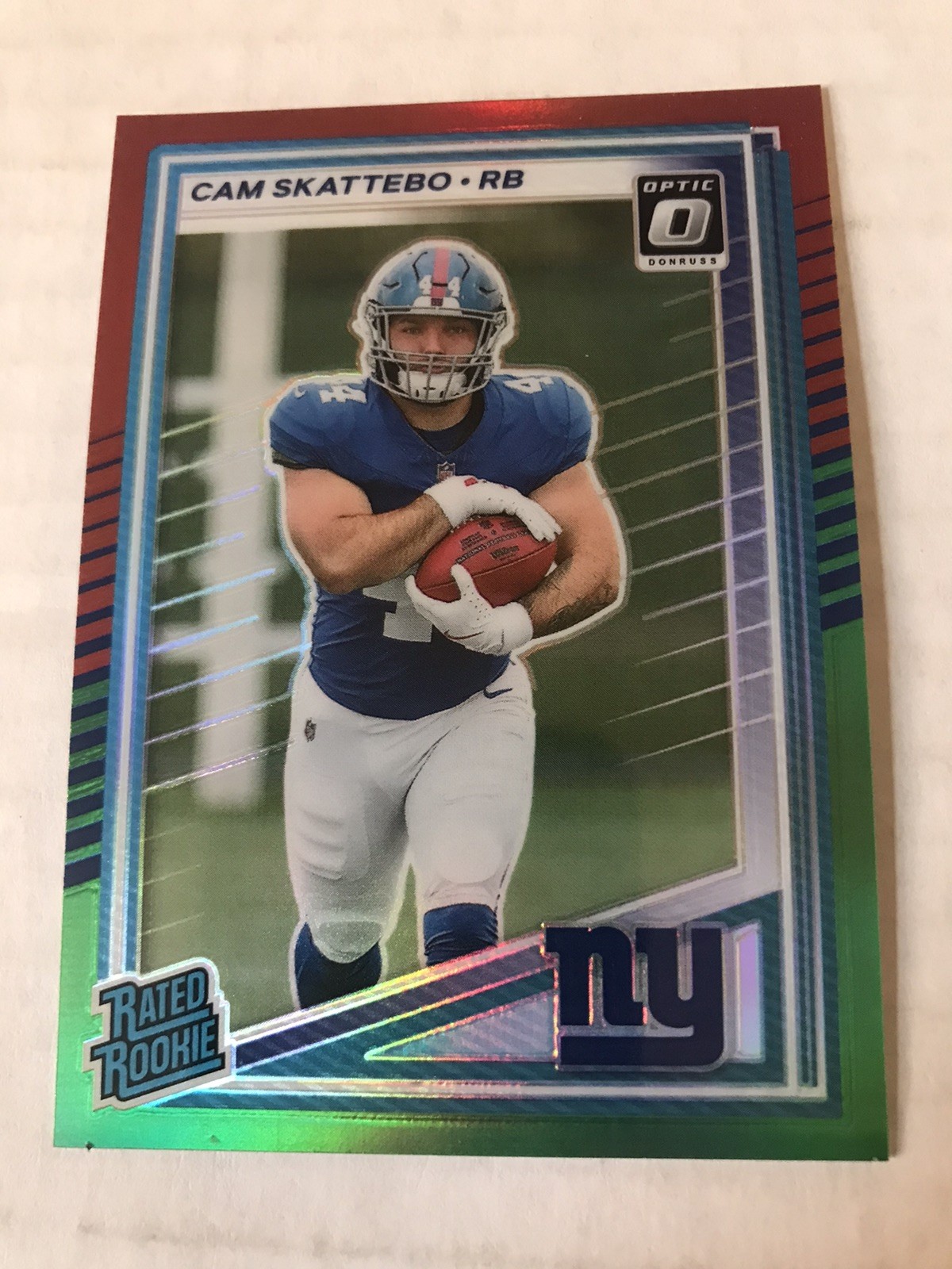 2025 Panini Donruss Rated Rookie Cam Skattebo #302 Optic Preview Holiday Prizm