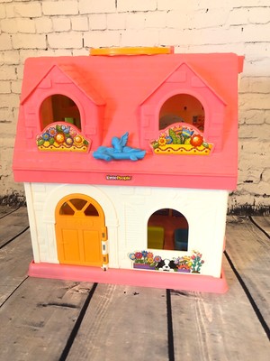 fisher price surprise and sounds dollhouse