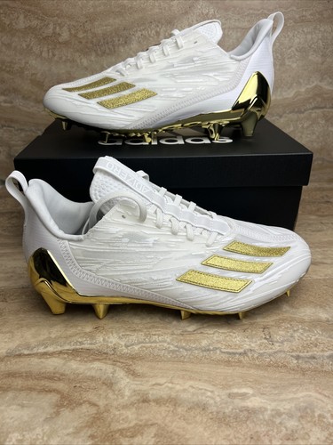 white and gold adidas cleats
