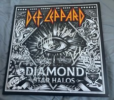 Joe Elliott, Rick Savage, Phil Collen, Rick Allen signed Album Def Leppard Proof
