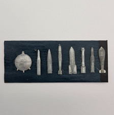 German WWII WHW 1940 Geschosse und Munition 9 Original Zinc Tinnies mounted pin