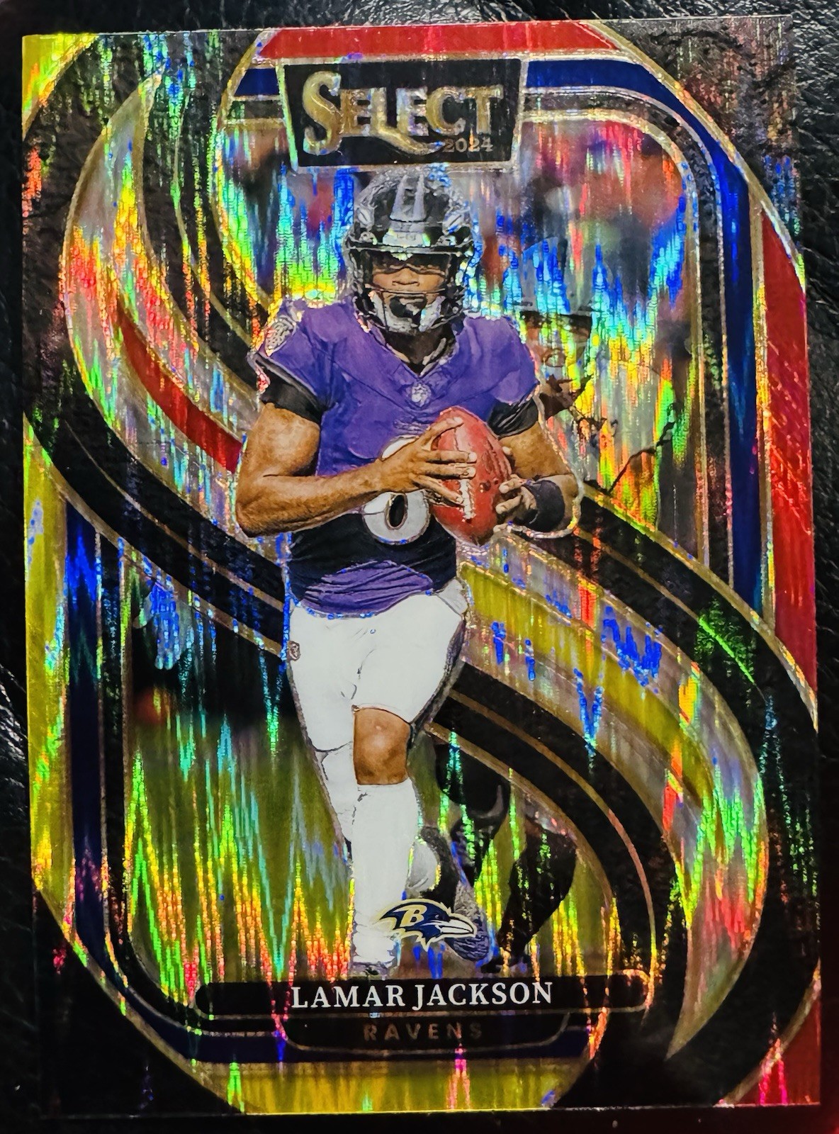 2024 Panini Select - Premier Level Lamar Jackson #121 Red & Yellow Shock Prizm