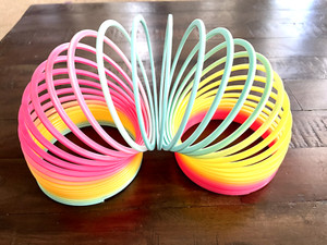 SLINKY SPRING  LARGE SIZE LOVELY VIBRANT MULTI COLORED SLINKY SPRING