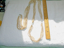 Long Seed Pearl Style with silver inserts mid...