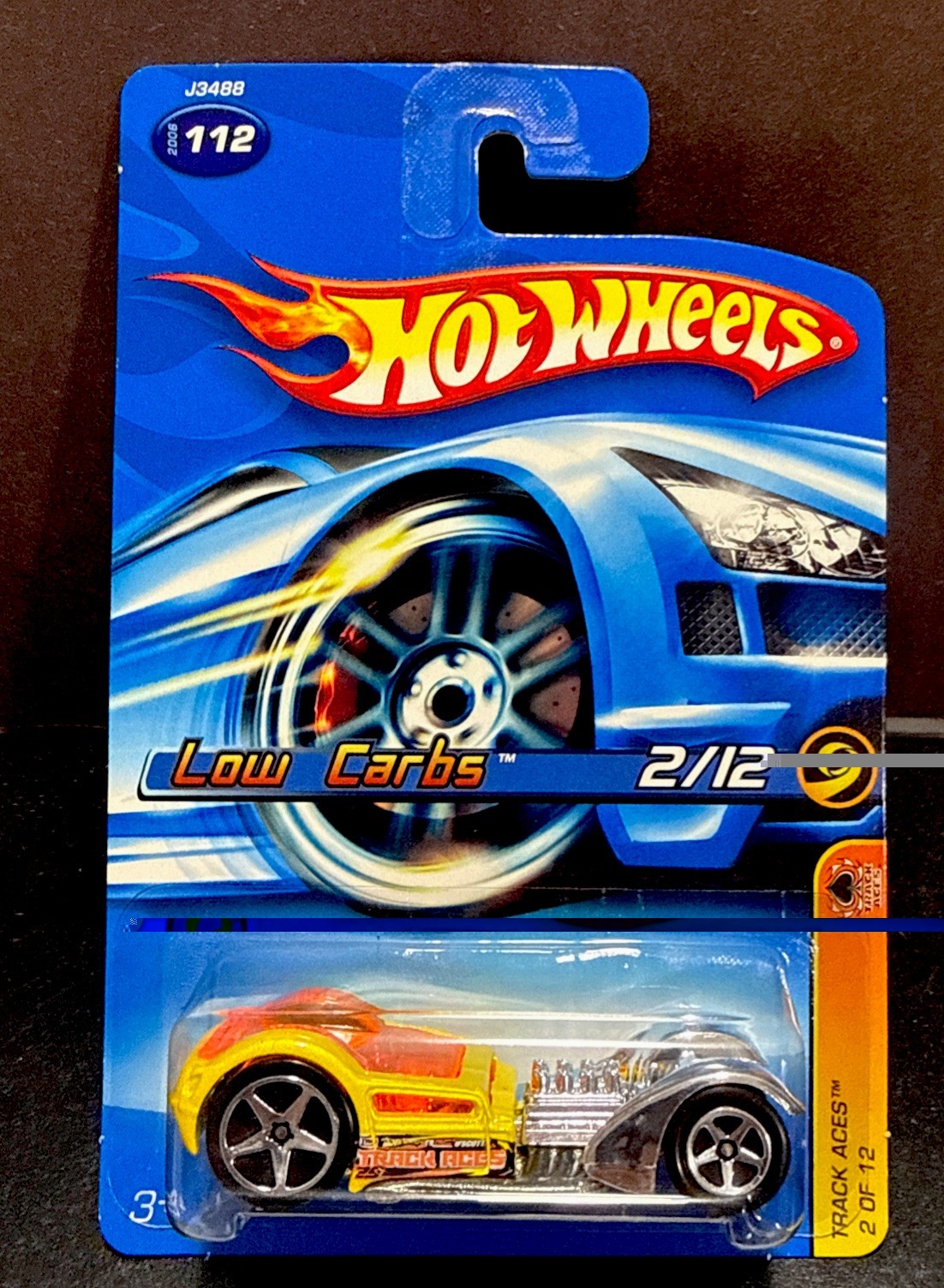 Hot Wheels 2006 Low Carbs - Track Aces - Yellow, 5SP wheels - Futuristic Car