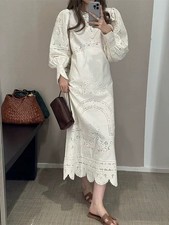 Sezane hollowed out embroidered lantern sleeve high waisted round neck dress