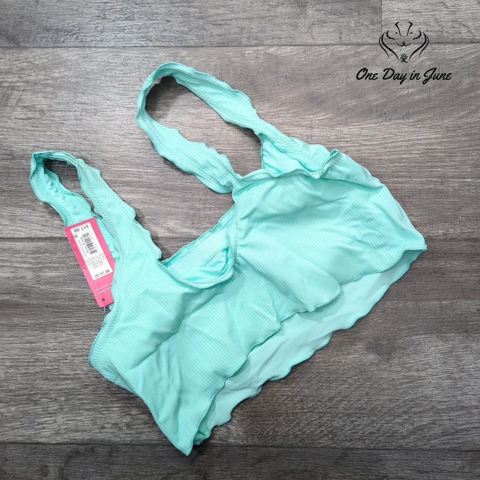 Top de bikini corto con volantes Xhilaration talla M (4-6) Foto 4 de 4