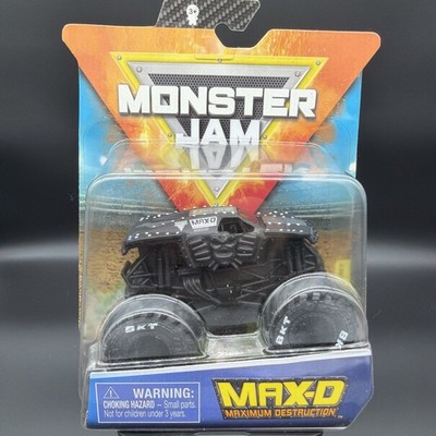 MONSTER JAM 1:64 SCALE MAX D BLACK OUT SERIES 9 NIB W/VIP Wristband  in box. 
