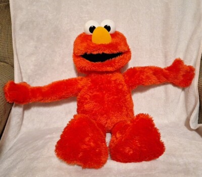 Tickle Me Elmo Plush Sesame Street Moves, Giggles, Vibrates Works great 2012