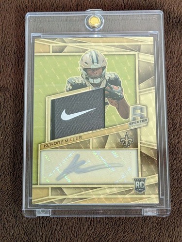 2023 SPECTRA GOLD VINYL NIKE SWOOH 1/1 JERSEY AUTO KENDRE MILLER SAINTS