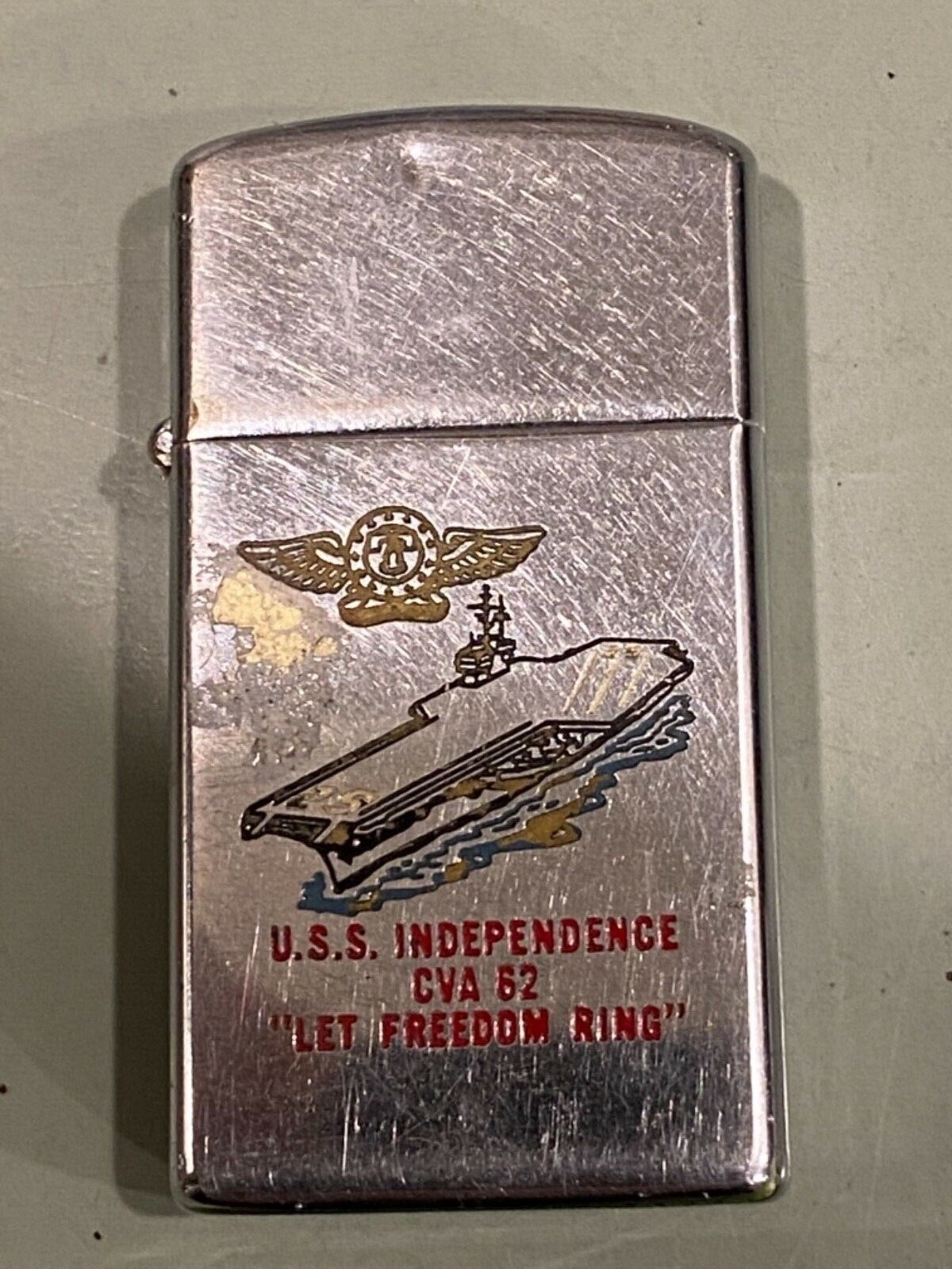 A Vietnam War era Zippo slim lighter USS Independence CVA 62 | eBay