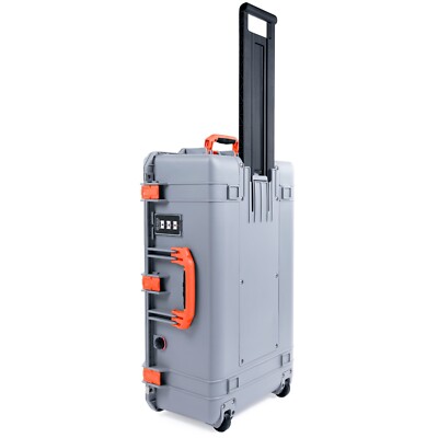 Silver & Orange Pelican 1595 Air case, empty.  With wheels.