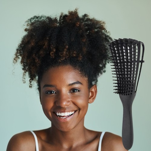 Cepillo de cabello desenredante rosa mediano - Imagen 2 de 3