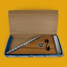 Instrumento musical Zippy Zipper vintage con caja original