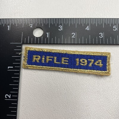 #ad Vintage 1970s Gold On Blue Gun Shooting Patch RIFLE 1974 25NZ $4.99