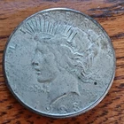 1923-S Silver Peace Dollar ( Circulated Toned Scatched See Pictures)
