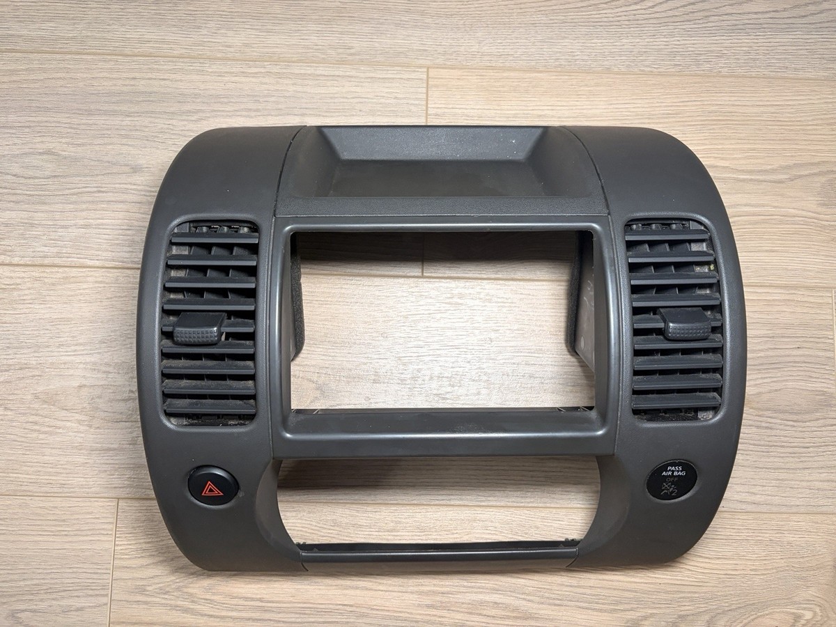 2005-2007 NISSAN XTERRA RADIO AC CLIMATE DASH PANEL BEZEL VENTS