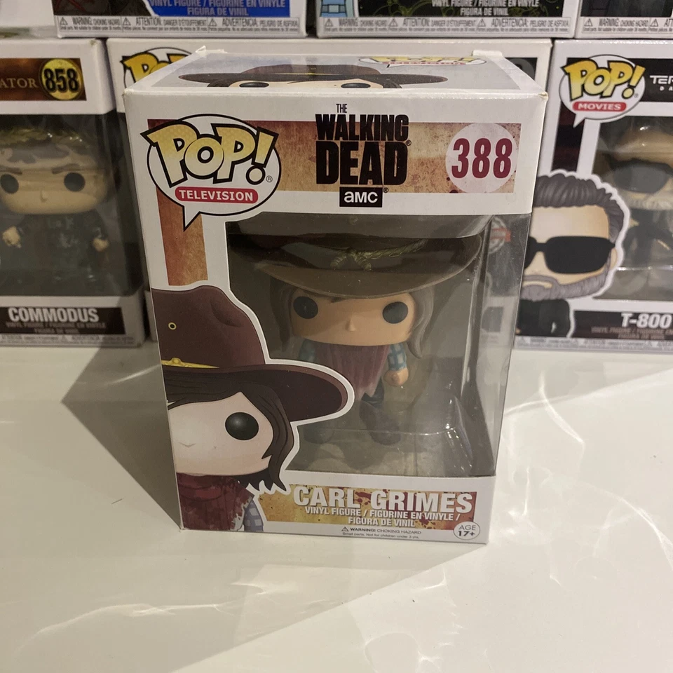 The Walking Dead Funko Pop #388 Carl Grimes - Photo 1/1