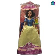 Muñeca Blancanieves exclusiva de Disney Store con figuras Dopey y Happy 2009