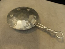 Vintage hammered aluminum silent butler marked Buenilum