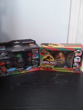 two boxes Jurassic Park and world dinosaur eggs three in each box brand new