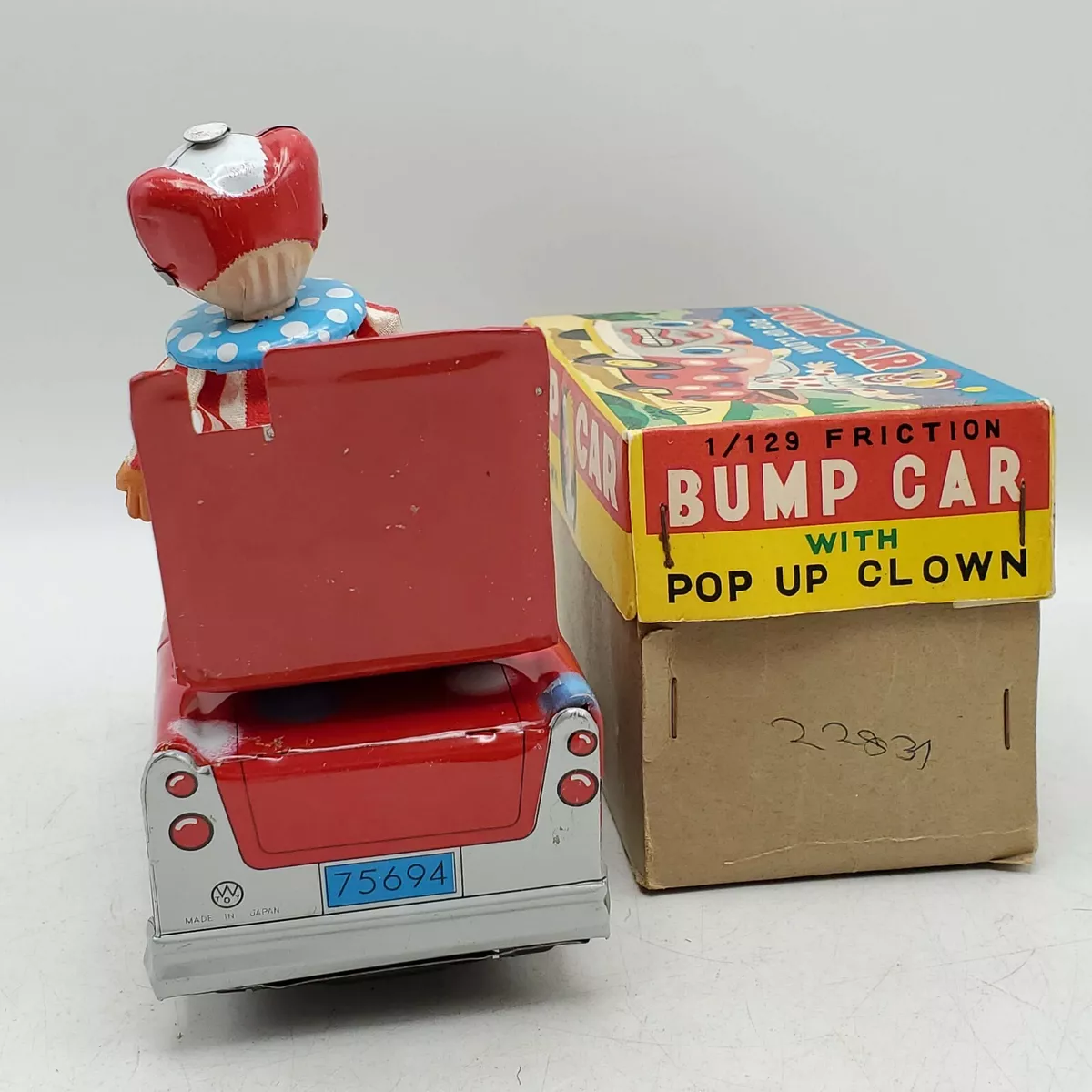 Vintage Wakasuto Bump Car Pop Up Clown Tin Litho Friction Toy w