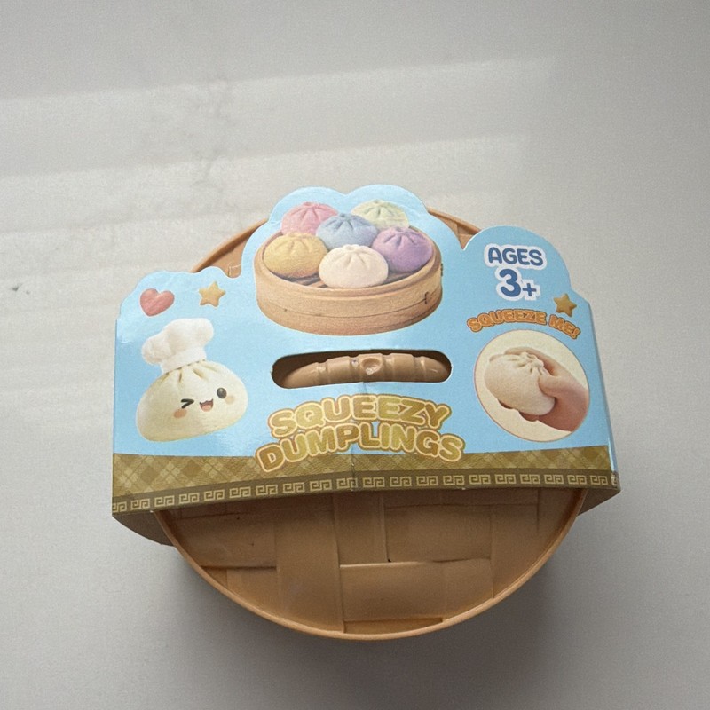 Squeezy Dumplings Gold Glitter Gel Dumpling Squeeze Ball Squishy Toy