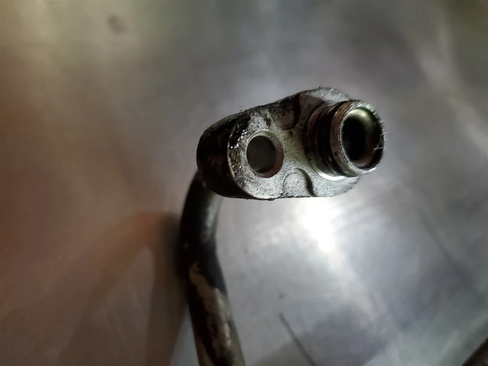 Tubo de manguera de aire acondicionado Cadillac SRX 2004-2009 maletero trasero usado OEM Foto 3 de 4