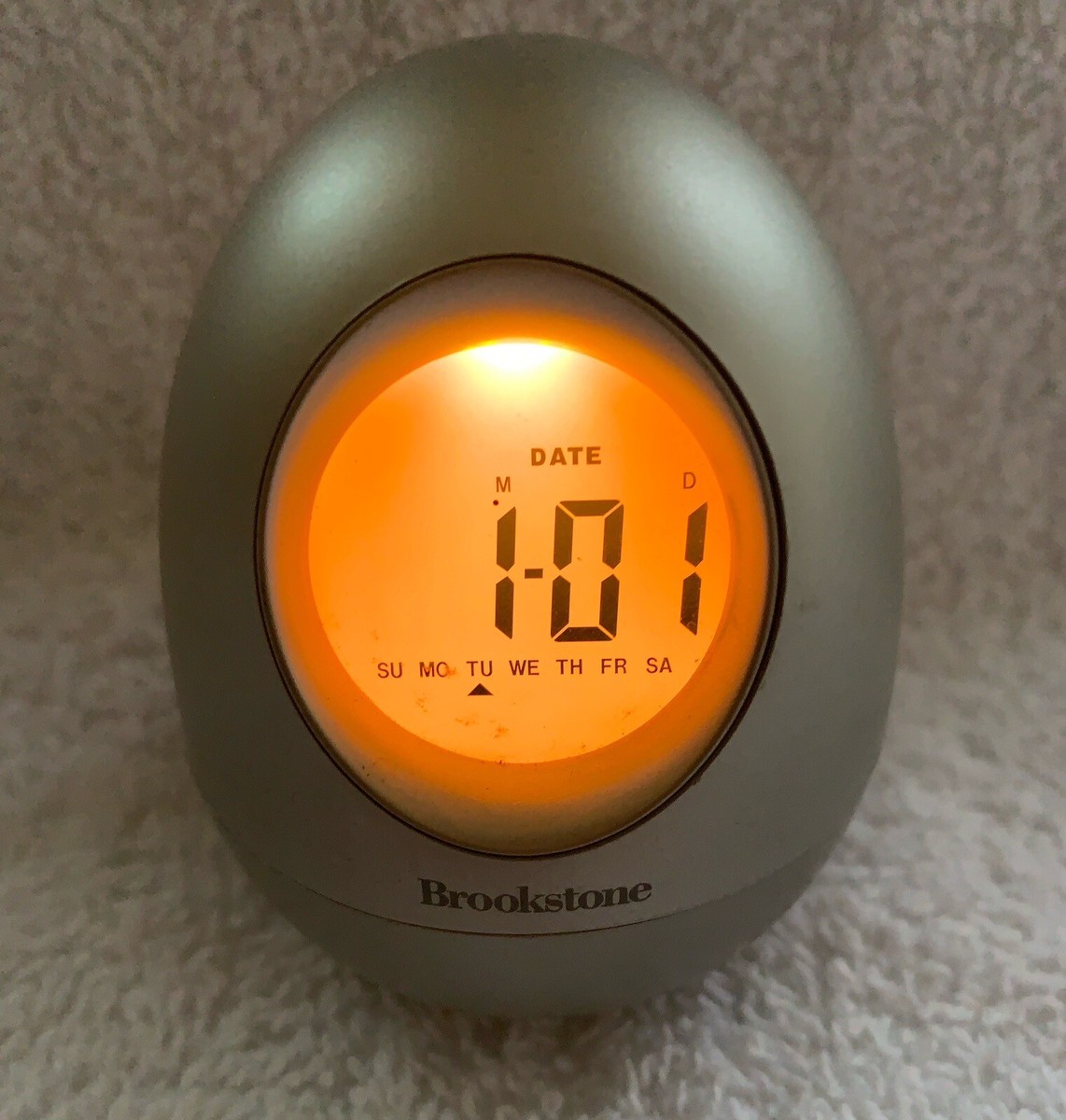 Brookstone “Bob” Silver Oval Egg Wobble Clock 5-in-1 Time