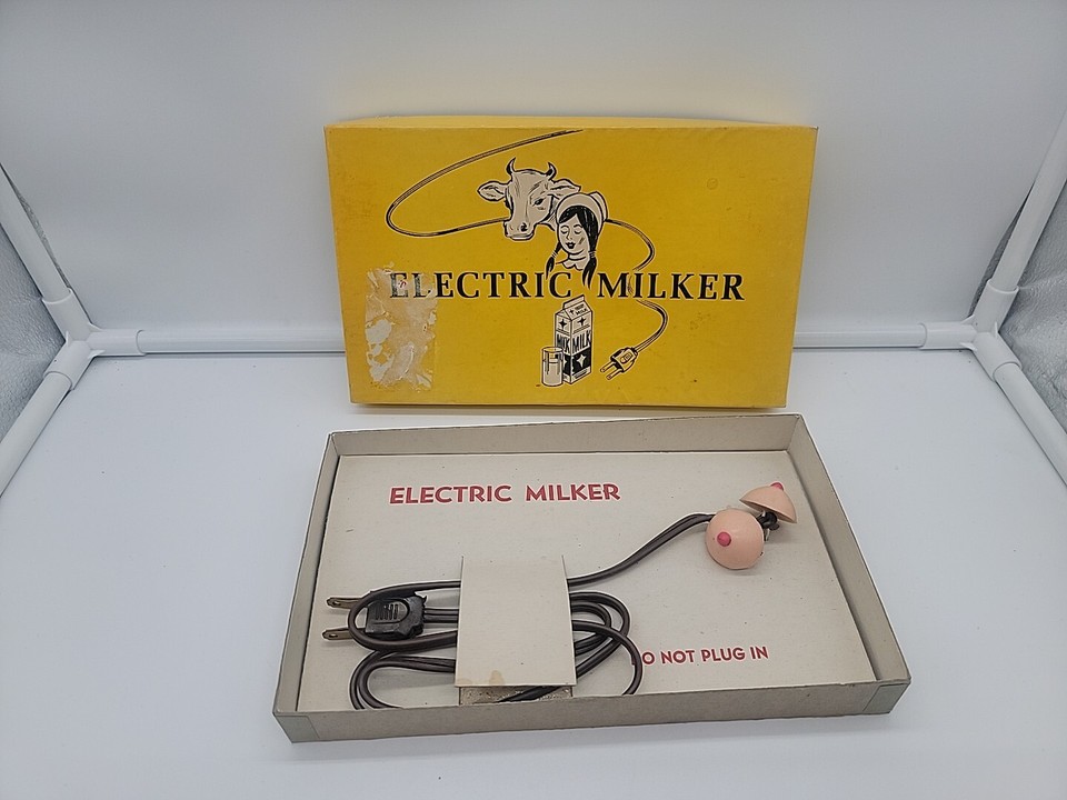 A genuinely bizarre vintage novelty electric 'milker' gag device — still in its original box, which makes it peak white elephant absurdity.