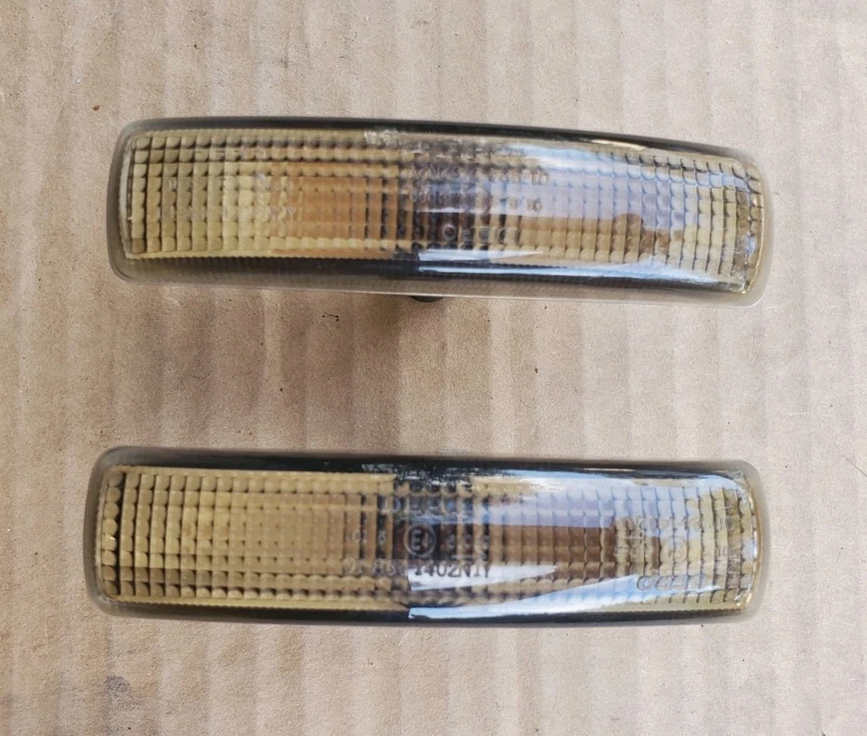 LAND ROVER LR2 / LR3 / LR4 LÂMPADAS INDICADORAS FUMÊ COM LÂMPADAS LARANJA CONJUNTO DE 2 FABRICANTE DE EQUIPAMENTO ORIGINAL - Imagem 2 de 3