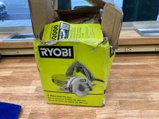 Ryobi (TC401) 12 -Amps 4 in. Blade Corded Wet Tile Saw - NEW-BOX DAMAGED!!!