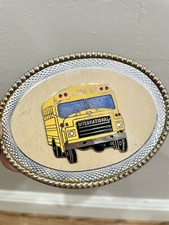 VINTAGE YELLOW BUS DRIVER A BUSES INTERNATIONAL BELT BUCKLE NL